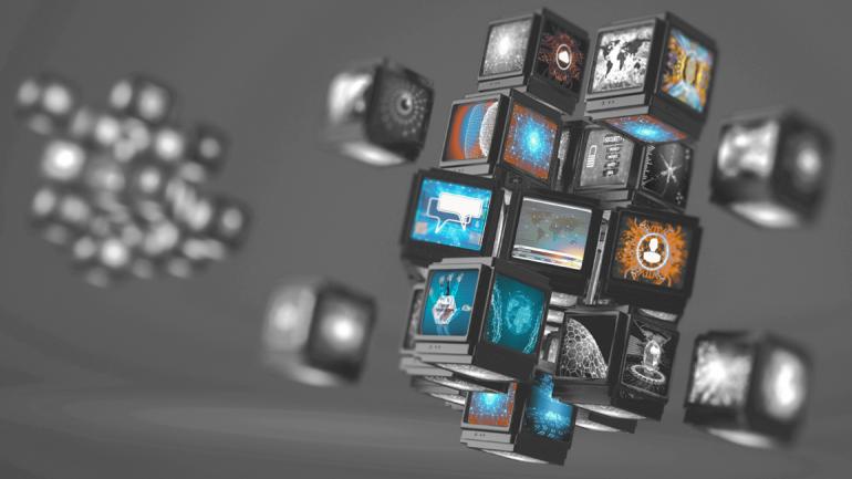 several cubes with screens on which various colorful images are displayed. 